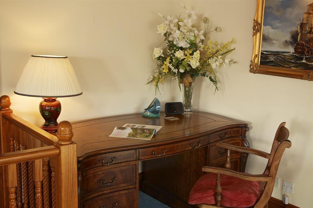Raised area to the rear of the lounge with desk at Startline House in Newton Road, Salcombe