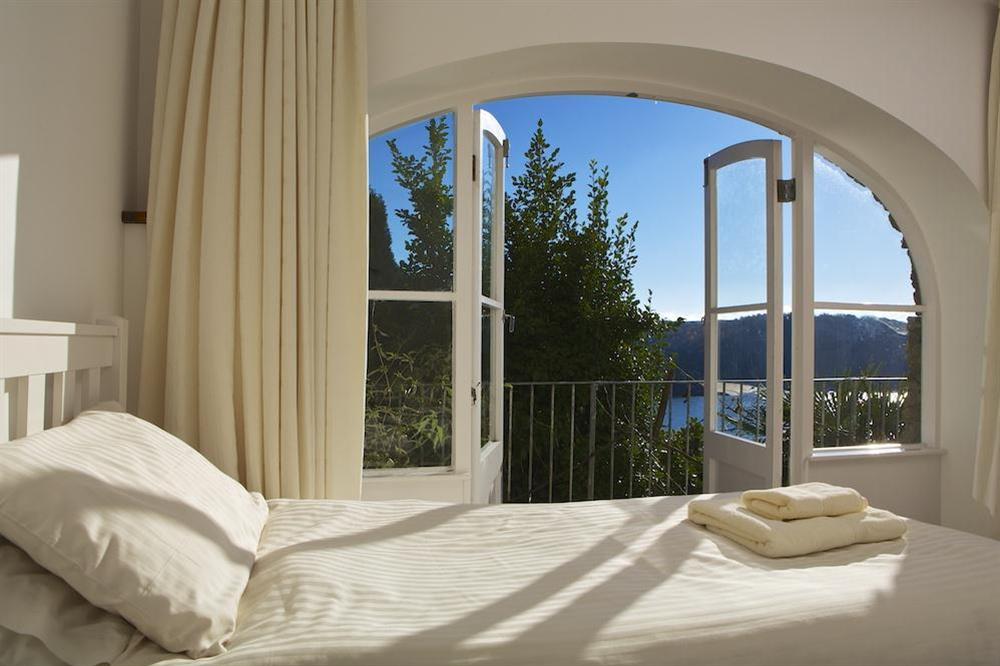 Twin bedroom with lovely views and doors out to the decking (photo 2) at Startline House in Newton Road, Salcombe
