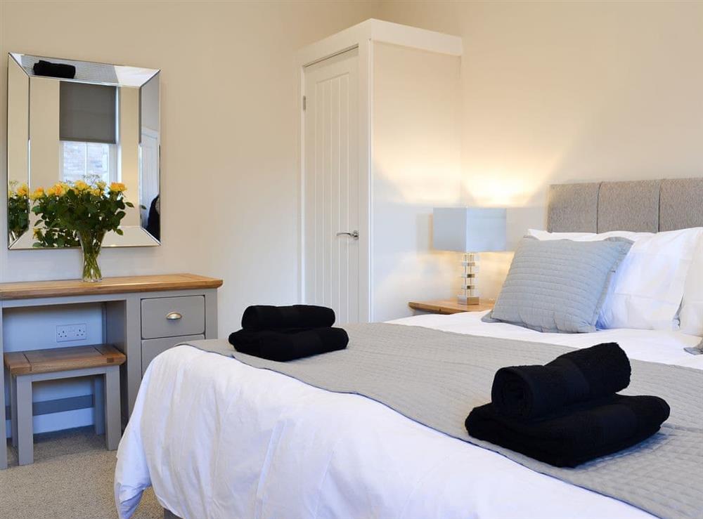 Warm and inviting double bedroom at The Carriage House, 