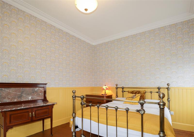 A bedroom in Station House at Station House, Lybster