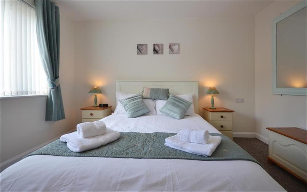 The stylish and comfortable master bedroom at Step-A-Side in Looe