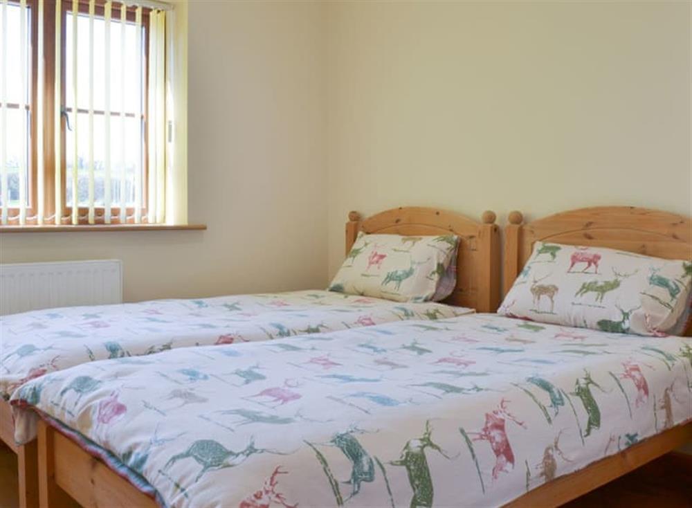 Comfortable twin bedroom at Stepen Cottage, 