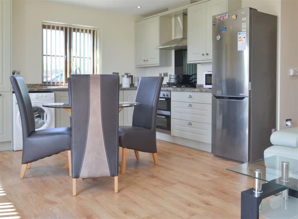 Fully appointed kitchen and dining area at Stepen Cottage, 