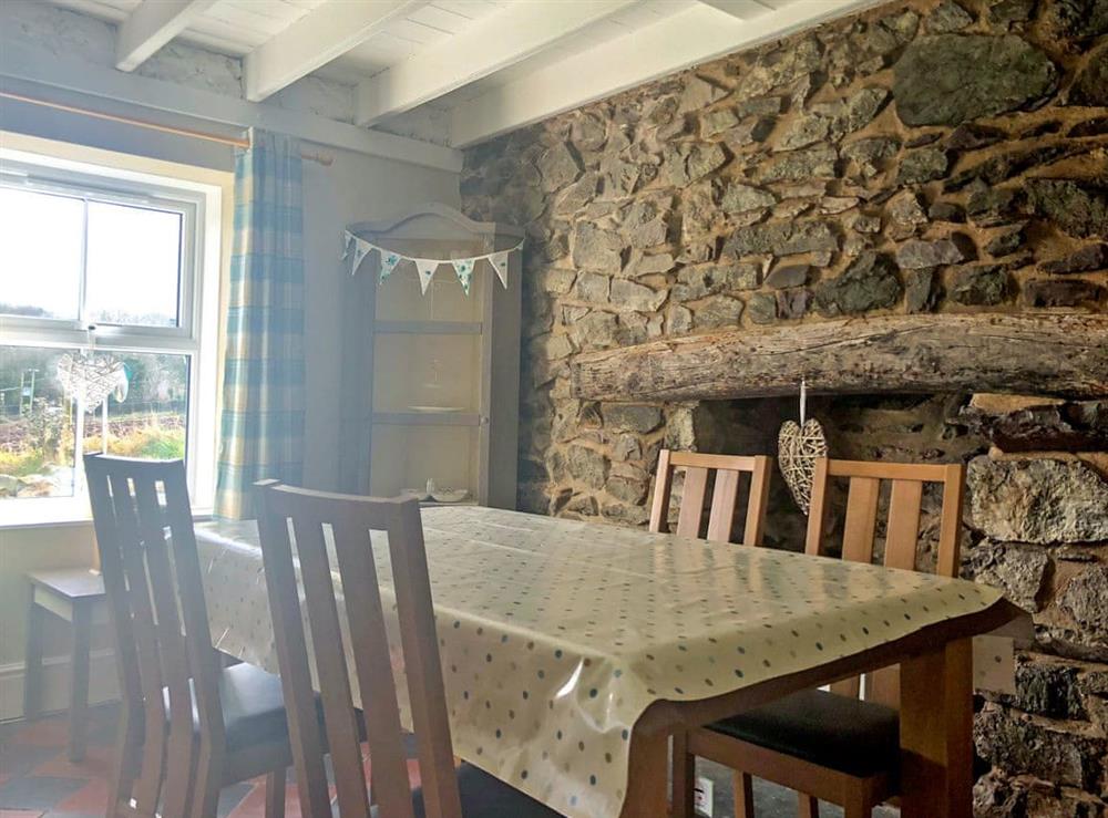 Charming dining room with beams at Stephens Cottage in Llangwm, near Haverfordwest, Dyfed