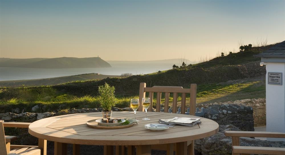 The outside seating area at Stepper View in Polzeath, Cornwall