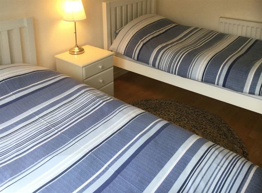 Charming bedroom with twin single beds at Stepping Stones in Trearddur Bay, near Holyhead, Anglesey, Gwynedd