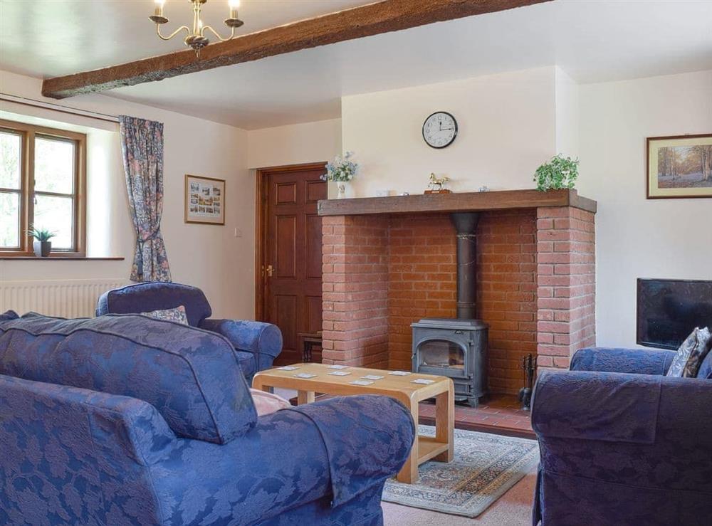 Characterful living room at Stildon Manor Cottage in Menith Wood, Worcestershire