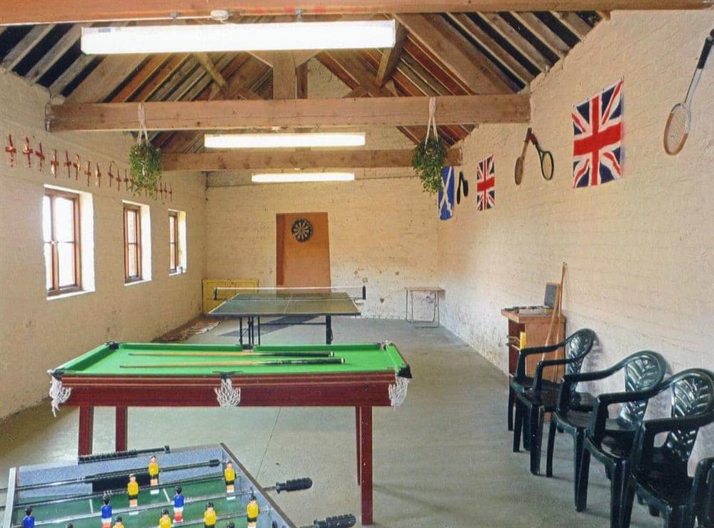 Games room at Stildon Manor Cottage in Menith Wood, Worcestershire