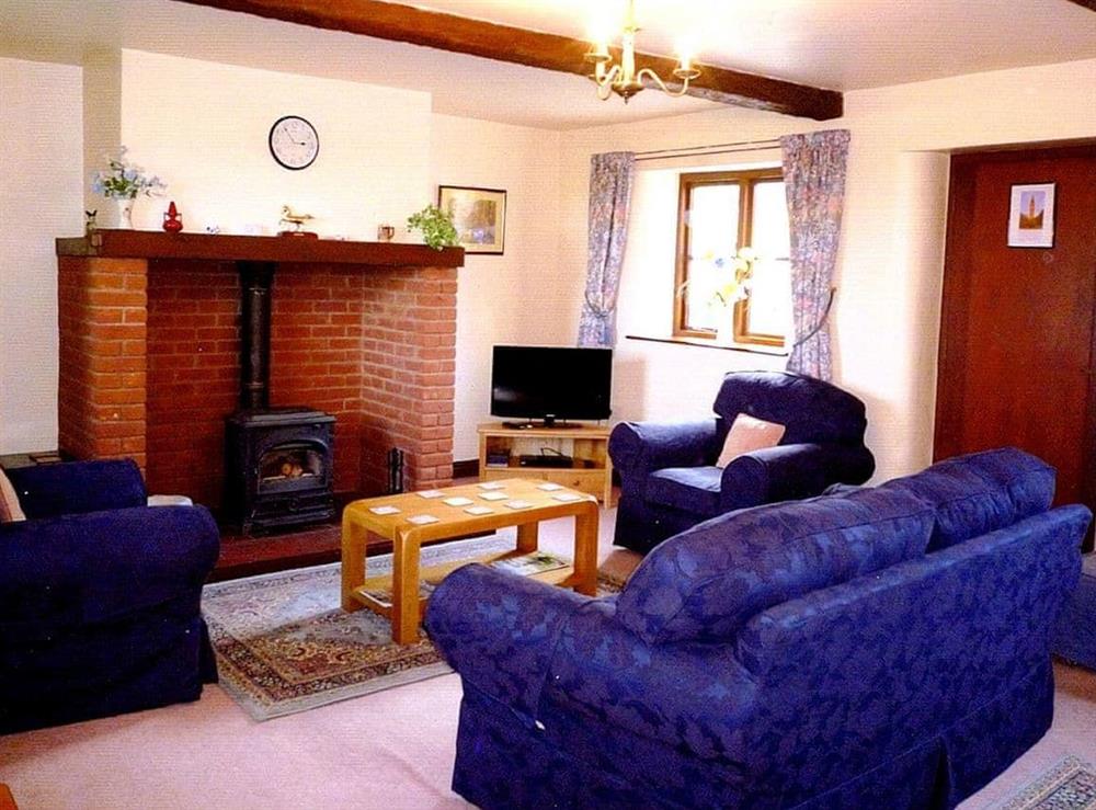Welcoming living room at Stildon Manor Cottage in Menith Wood, Worcestershire