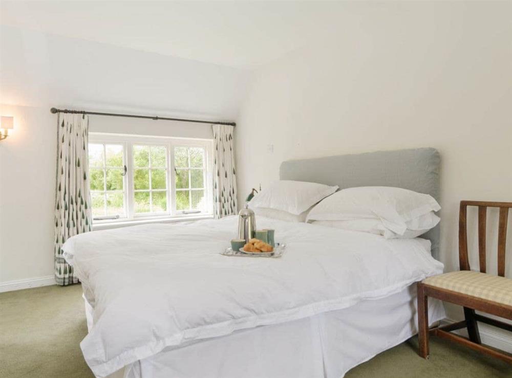 Comfortable double bedroom at Stitchcombe Mill in Stitchcombe, near Marlborough, Wiltshire