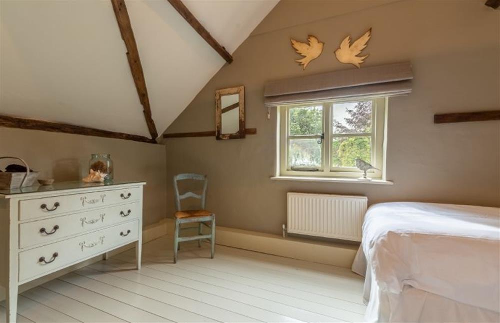 First floor: Bedroom two, twin room is bright and airy at Stockmans Cottage, Foulsham near Dereham