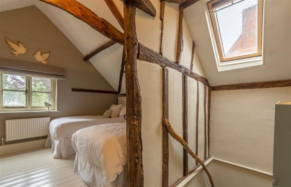 First floor: Landing and Bedroom two, twin room at Stockmans Cottage, Foulsham near Dereham
