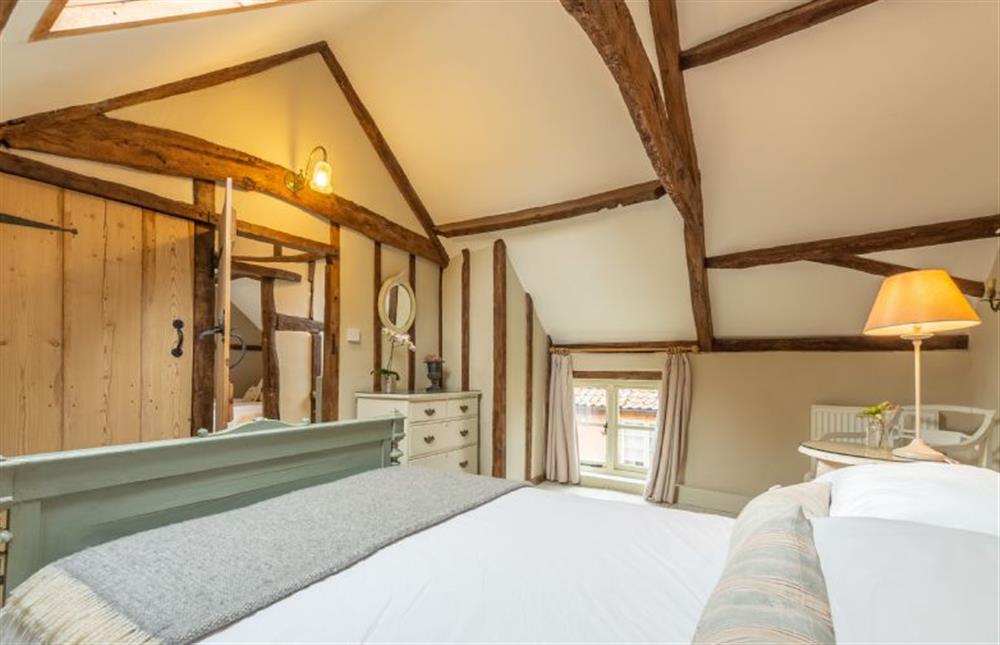 First floor: Master bedroom has en-suite shower room at Stockmans Cottage, Foulsham near Dereham