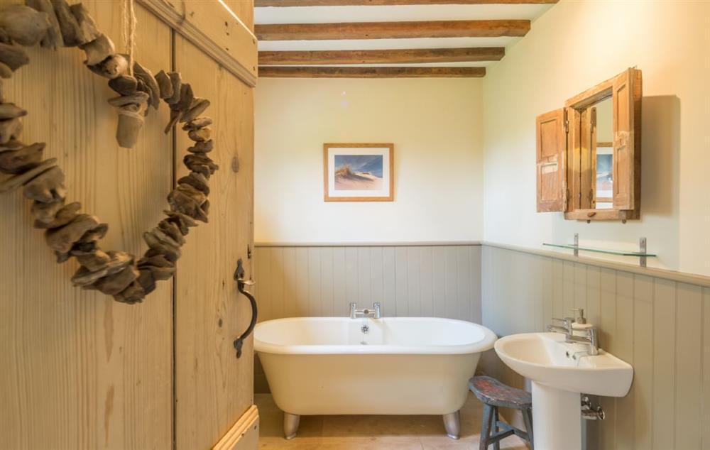 Bathroom freestanding claw-foot bath at Stockmans Cottage, Foulsham