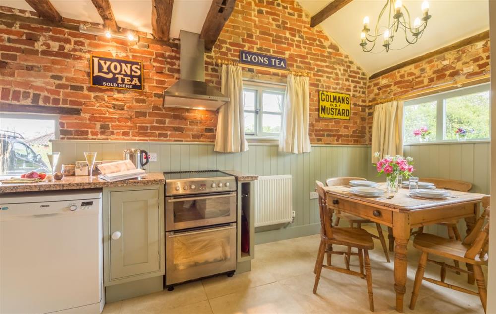 Kitchen/diner with a farmhouse table and chairs (photo 3) at Stockmans Cottage, Foulsham
