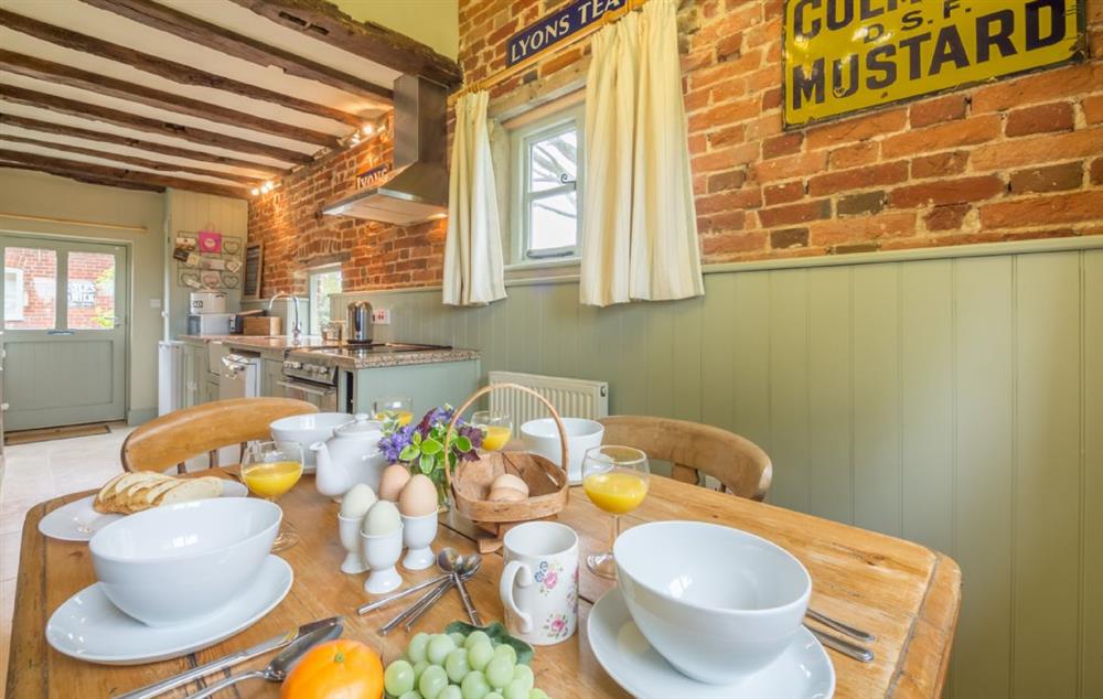 Kitchen/diner with a farmhouse table and chairs (photo 4) at Stockmans Cottage, Foulsham