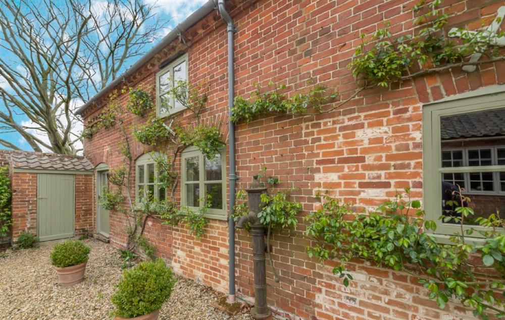 Stockman’s Cottage has plenty of off-road parking space and a delightful cottage style garden at Stockmans Cottage, Foulsham