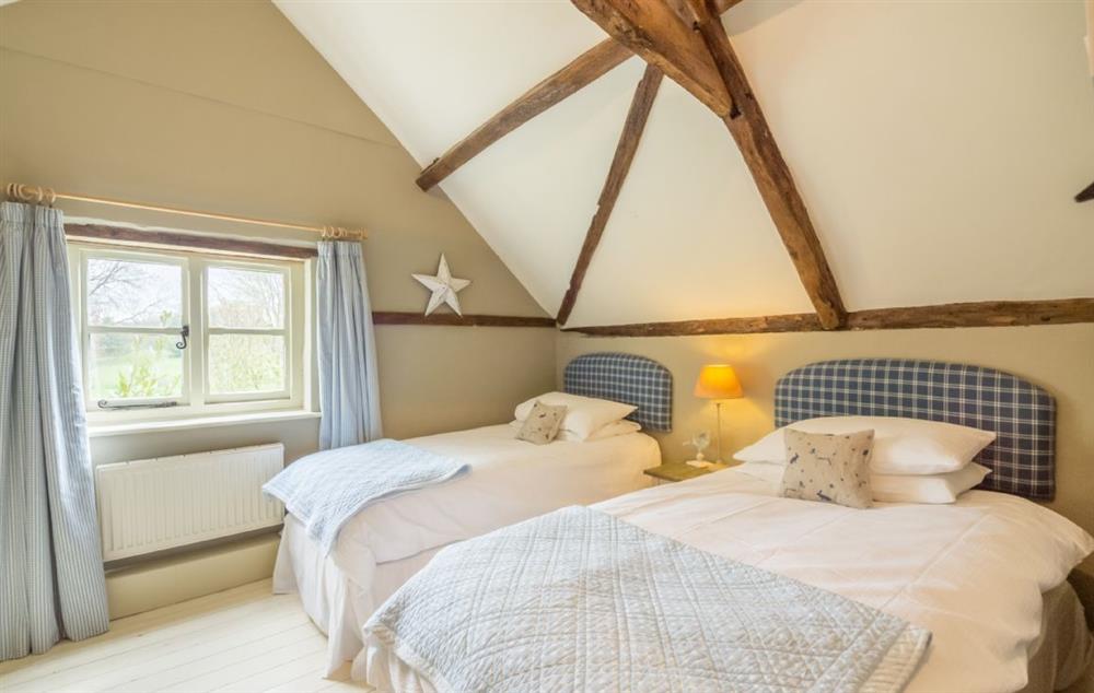 Twin bedroom with 3’ single beds at Stockmans Cottage, Foulsham