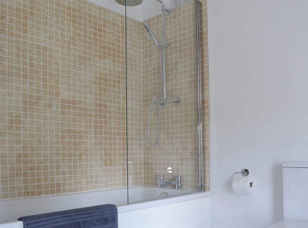 Stylish bathroom with shower over beth at Stockwell Street in Cambridge, Cambridgeshire