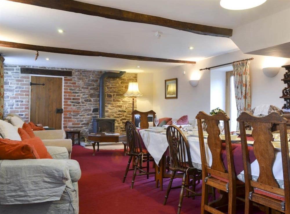 Spacious and confortable living and dining area at Stoke Court Farm Barn in Stoke St Milborough, Nr Ludlow., Shropshire