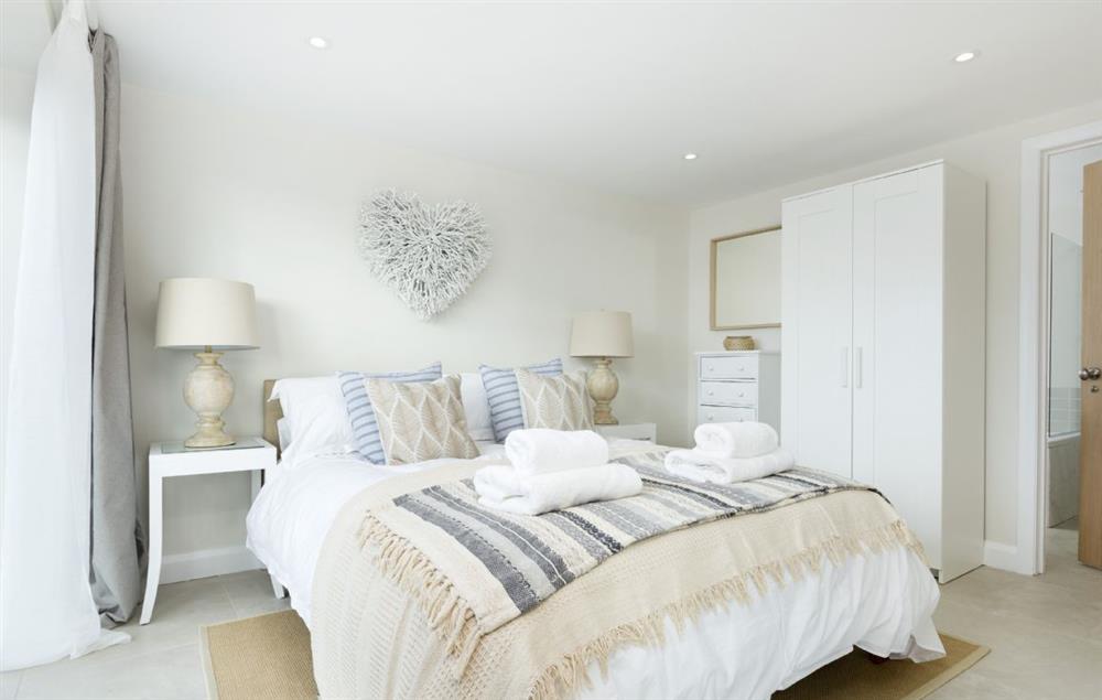 A stylish king-size bedroom at Stone Barn, Upper Swell