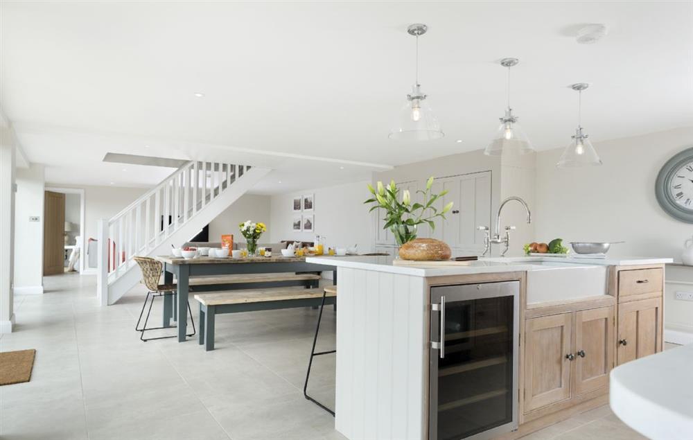 Open-plan living area with kitchen, dining area and sitting room at Stone Barn, Upper Swell