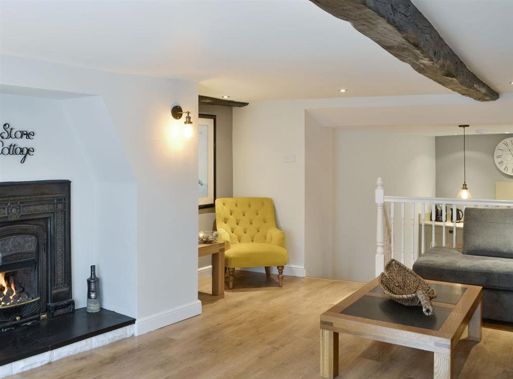 Stylish living room with open aspect to kitchen/diner at Stone Cottage in Morpeth, Northumberland