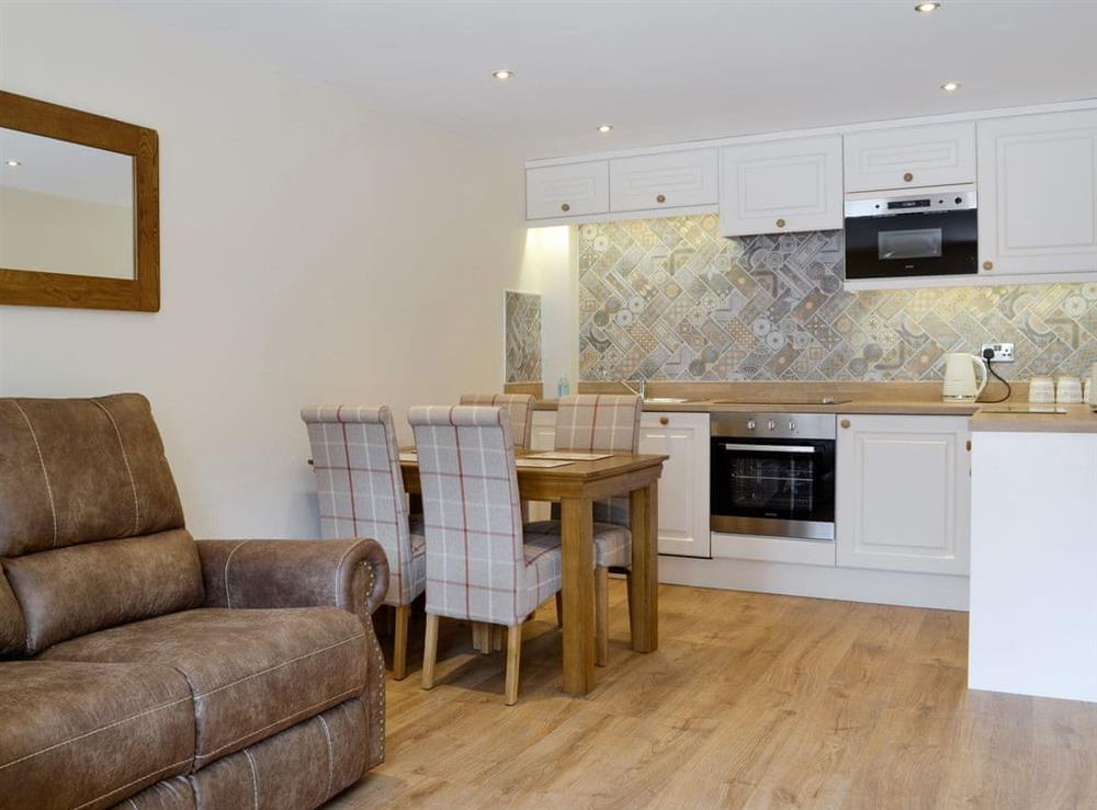 Spacious open-plan living space at The Byres Tan, 