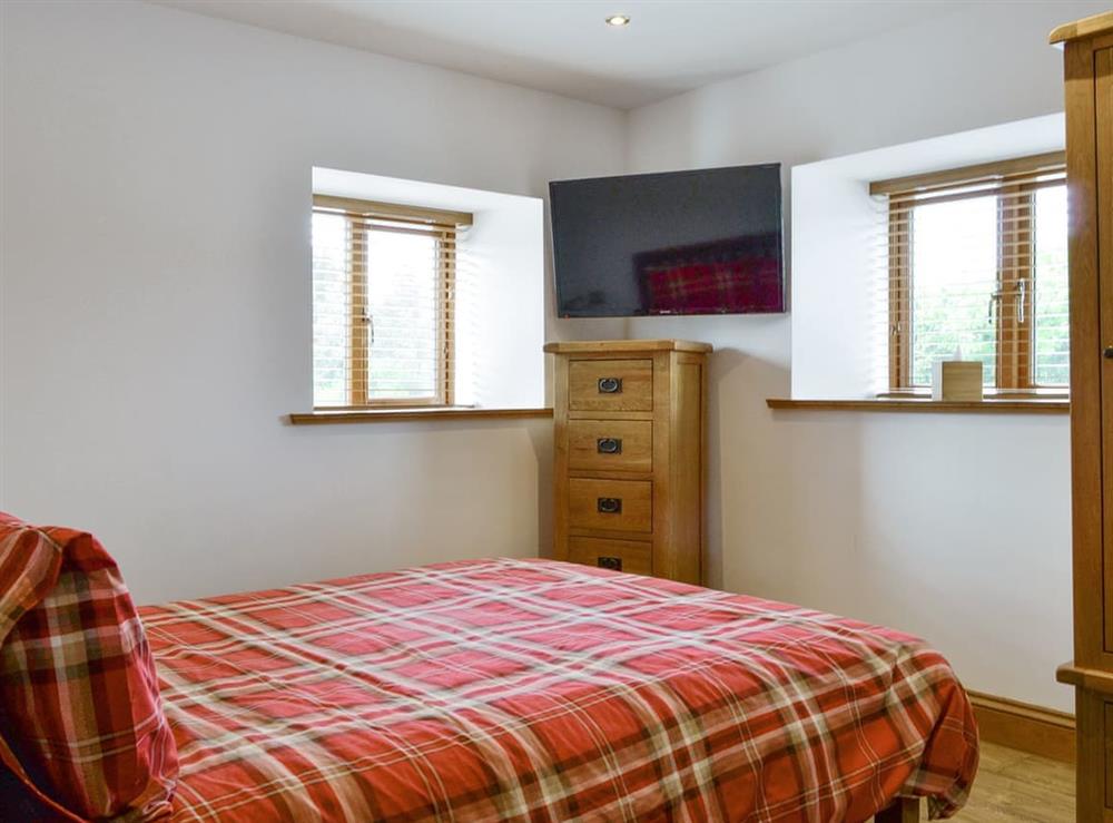 Relaxing double bedroom at The Byres Tethera, 