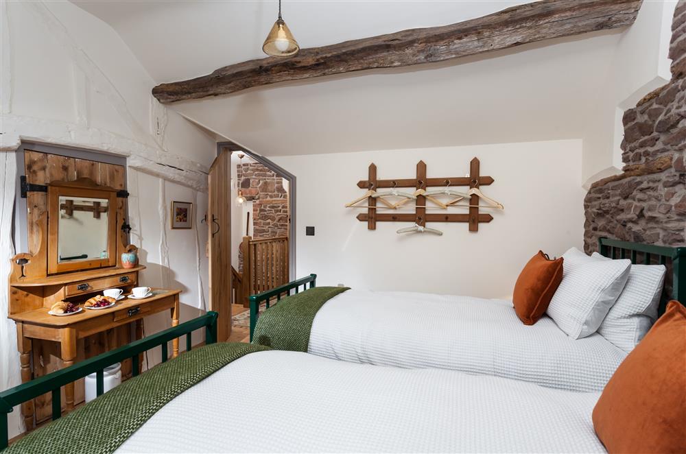 Bedroom three is filled with rustic charm at Stone House, Leominster