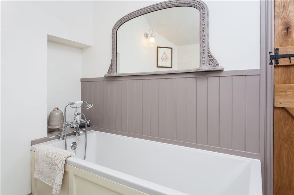 Relax in the full length bath in the family bathroom at Stone House, Leominster