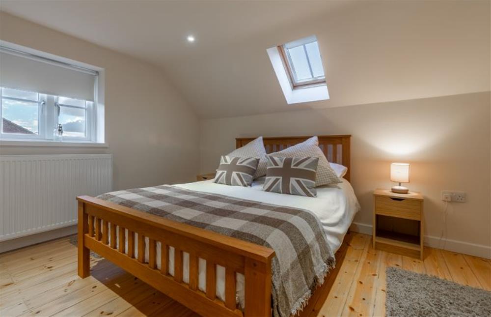 First floor: Double bedroom at Stone Lodge, Old Hunstanton