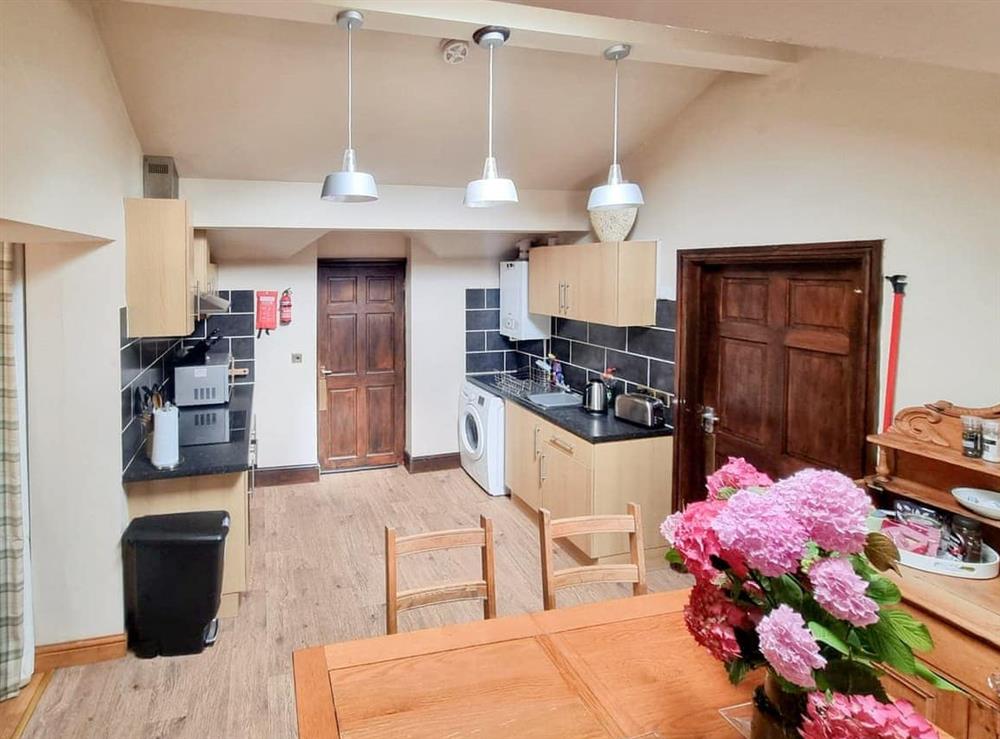 Practical kitchen/diner with delightful furniture at Stonecroft Cottage in Broughton-in-Furness, near Barrow-in-Furness, Cumbria