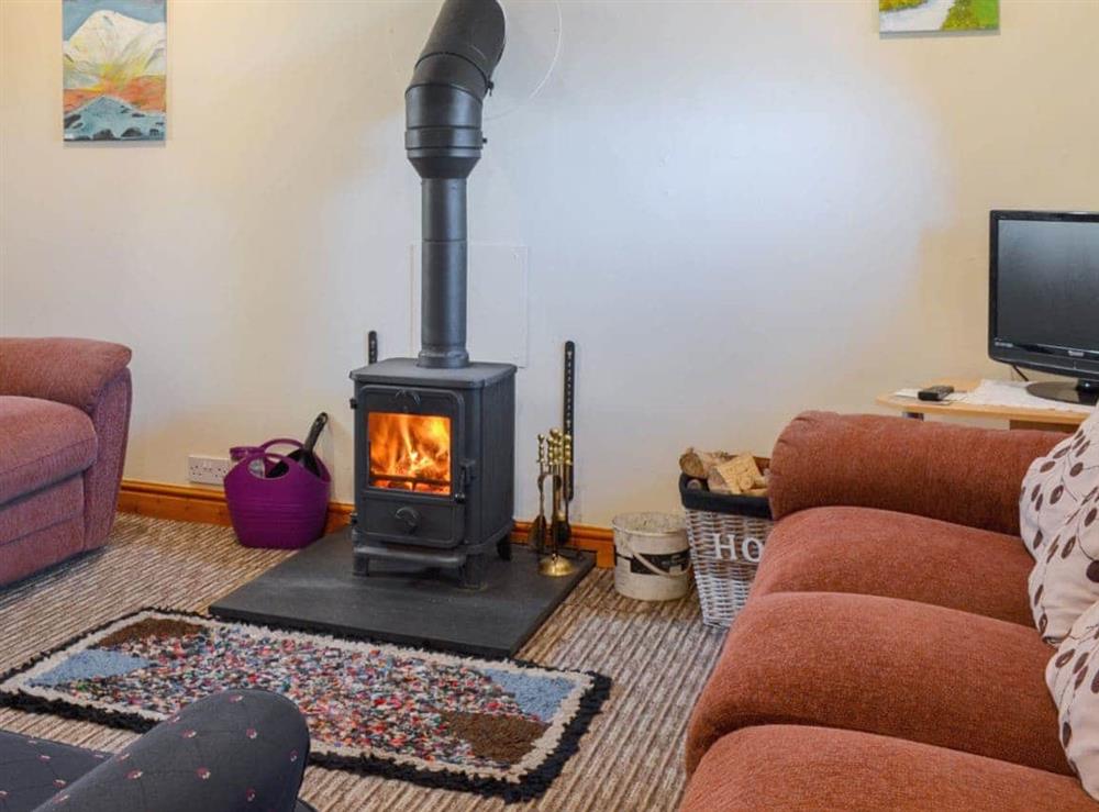 Comfortable living room at Stonefold Cottage in Waberthwaite, near Ravenglass, Cumbria