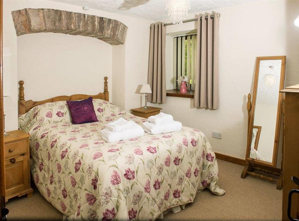 Characterful double bedroom at Curlew Cottage, 