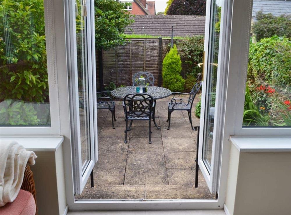 Conservatory with door leading to the enclosed courtyard