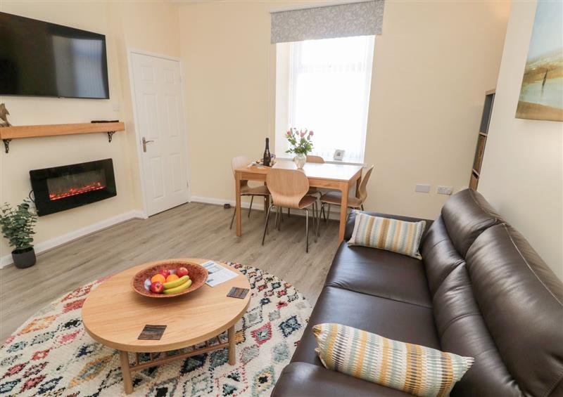 Relax in the living area at Stones Throw, Amble
