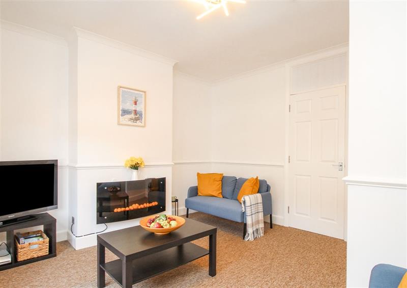 Relax in the living area at Stones Throw, Weymouth