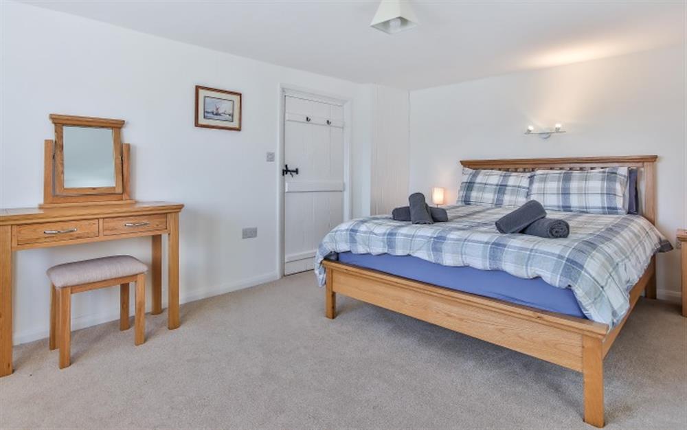 Bedroom 1 is spacious with front facing views at Stoneybridge Cottage in East Portlemouth