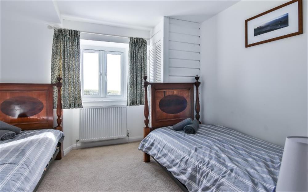 Bedroom 3-with twin beds at Stoneybridge Cottage in East Portlemouth