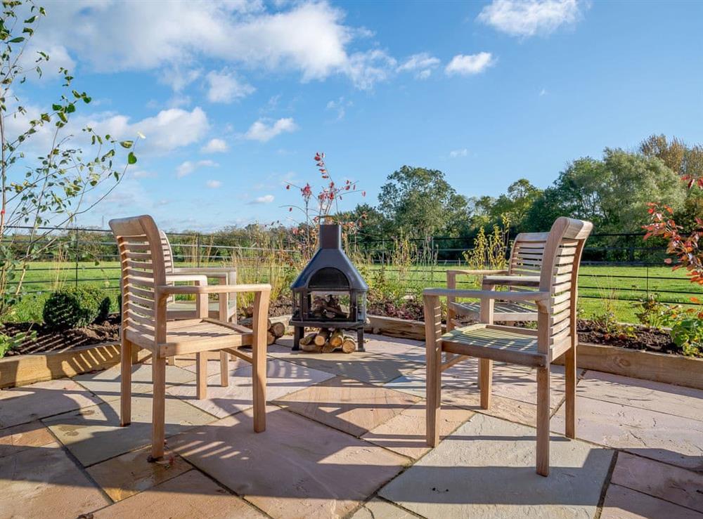 Delightful seating area on the patio at Hares Furrow, 