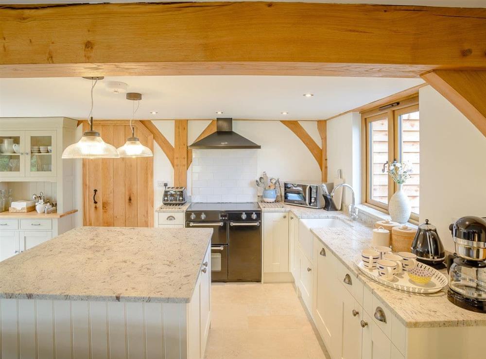 Well-equipped fitted kitchen at Hares Furrow, 