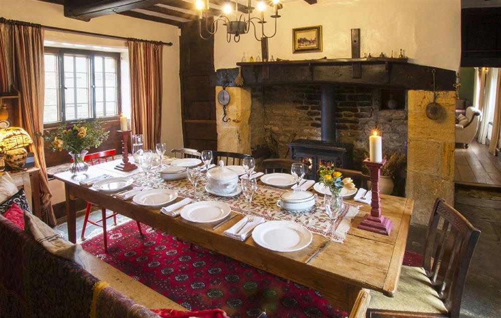 Dining room with wood burning stove at Stourton Manor, Stourton
