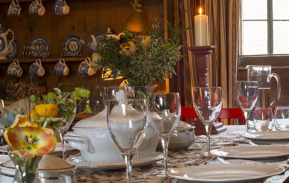 Family and friends can gather round the oak dining table to enjoy meals together at Stourton Manor, Stourton