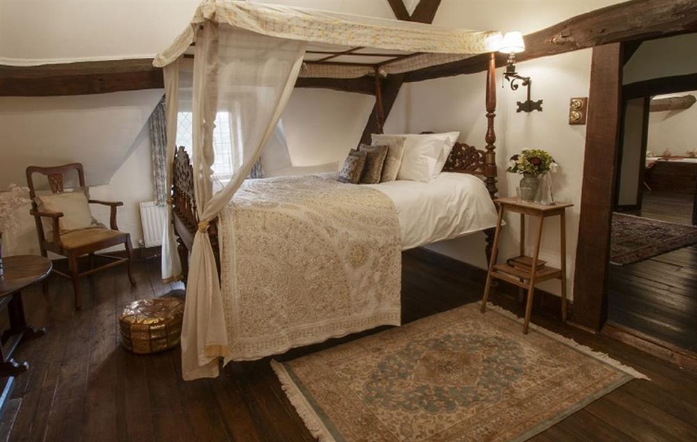 Fifth bedroom with an antique over-sized single four-poster Indian bed at Stourton Manor, Stourton