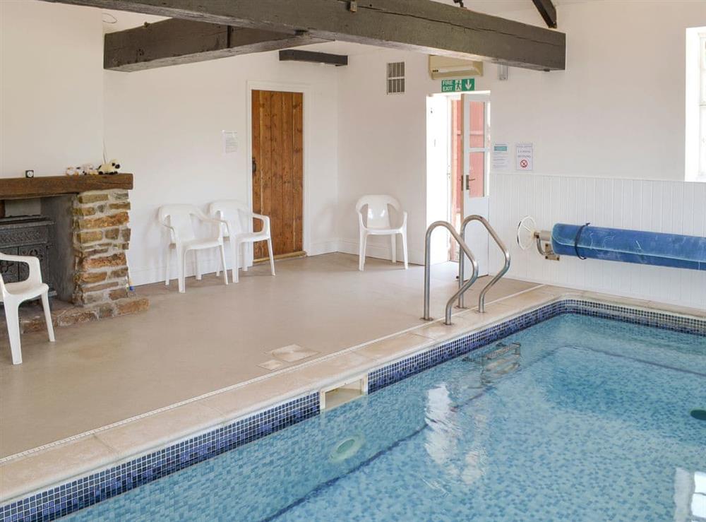Inviting indoor swimming pool at Halcyon Cottage, 