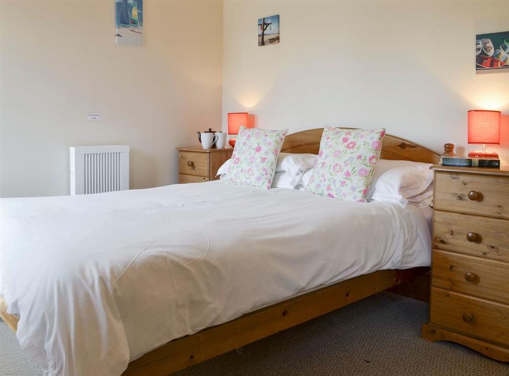 Relaxing double bedroom at Halcyon Cottage, 
