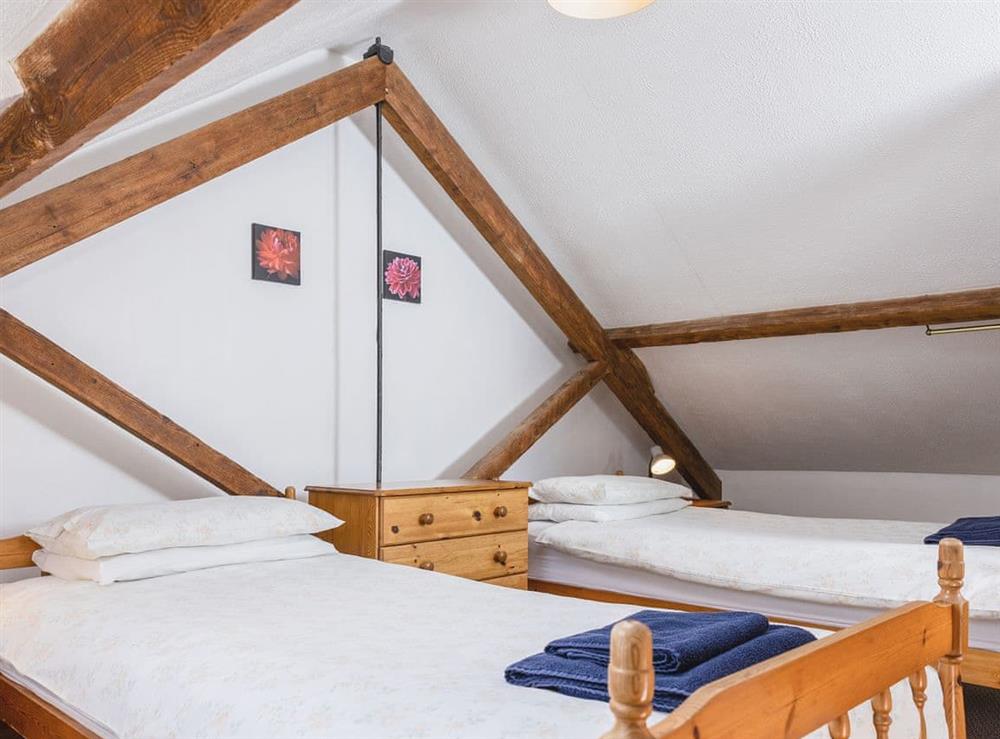 Comfortable twin bedroom at Old Nog Cottage, 