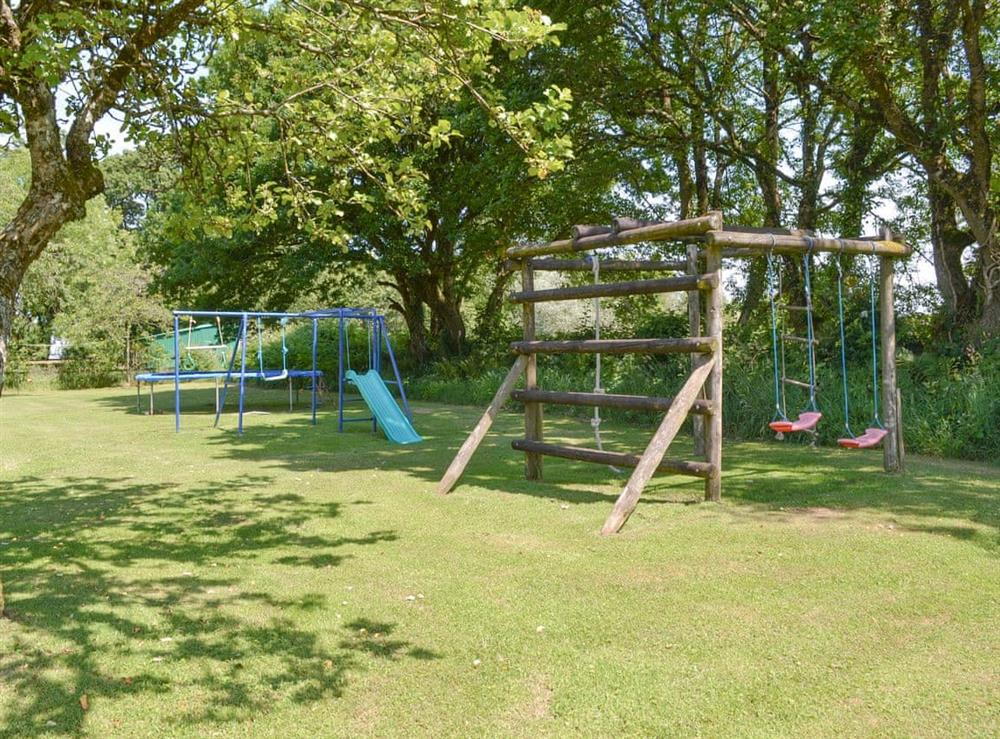Useful children’s play area at Tarkas Holt Log Cabin, 