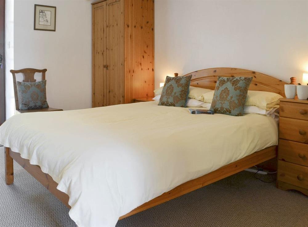 Restful double bedroom at Tarquol Cottage, 